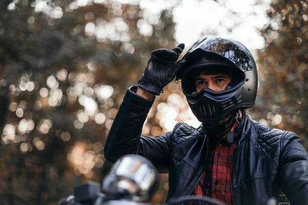 motorcyclist prepares for ride